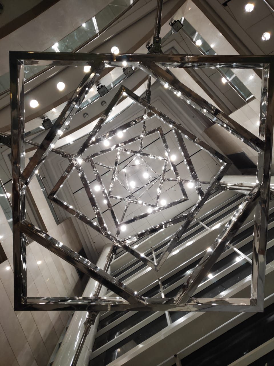 Seven frames, each held by four tensioned rods